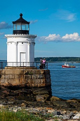 Watching Lobster Boat By Portland Breakwater Light